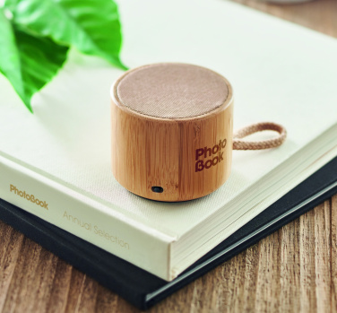 Logotrade corporate gifts photo of: Round bamboo wireless speaker