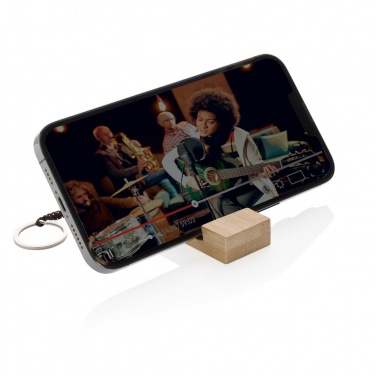 Logotrade presentreklam bild: Standkey bambu nyckelring telefonstativ